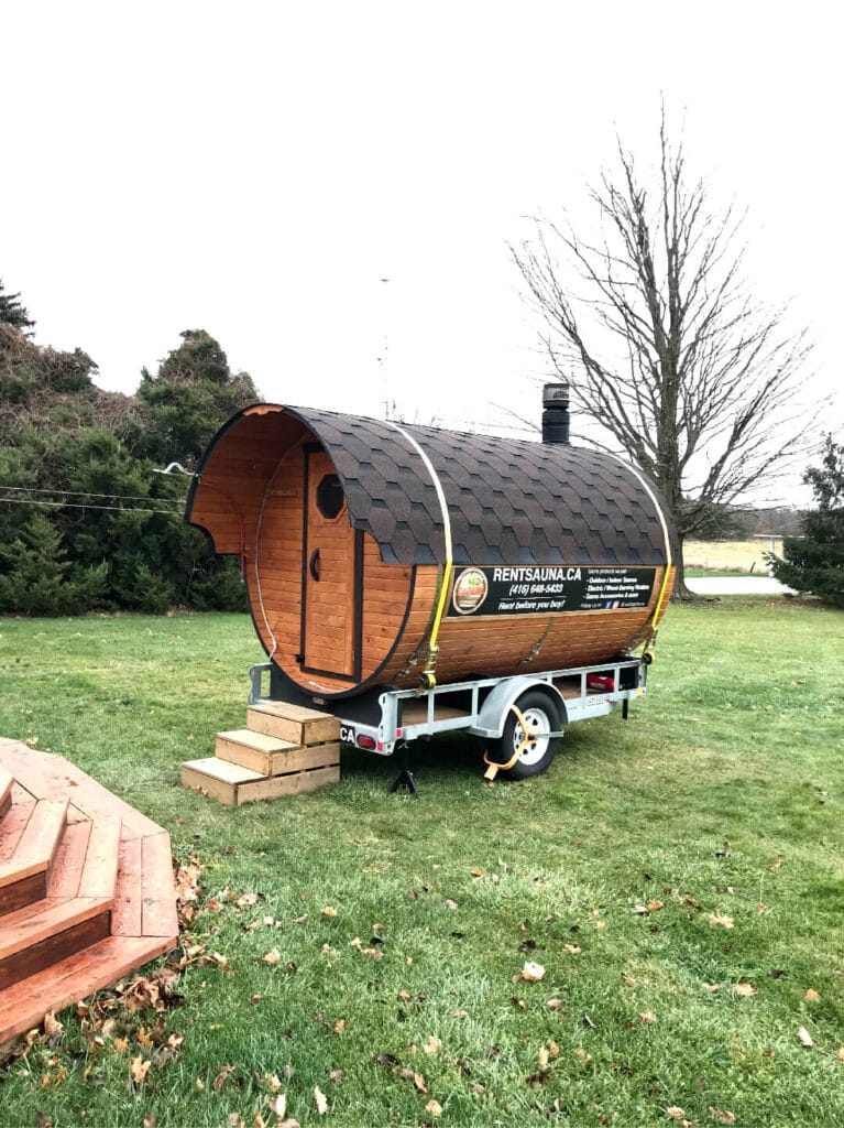 Round Standard mobile sauna set up on a lawn